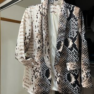 Snakeskin print blazer.